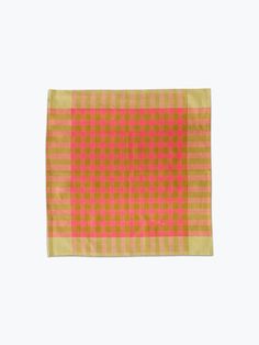 an orange and yellow checkered cloth on a white background