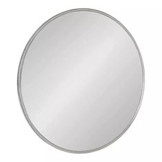 a round mirror on a white background