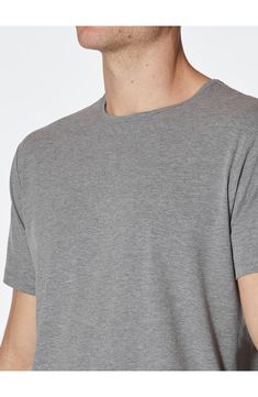 A curved hem enhances the fit of this versatile crewneck T-shirt made from soft, stretchy PYCA Pro® fabric that's wrinkle-resistant and retains its shape. 29 1/2" length (size Medium) Crewneck Short sleeves 62% polyester, 33% cotton, 5% spandex Machine wash, dry flat Imported Gray Crew Neck T-shirt For Loungewear, Relaxed Fit T-shirt With Curved Hem For Everyday, Sporty Crew Neck T-shirt For Layering, Relaxed Fit T-shirt With Ribbed Neckline For Loungewear, Sporty Plain Crew Neck Tops, Plain Crew Neck T-shirt For Layering, Basic Gray T-shirt For Layering, Casual Gray Scoop Neck T-shirt, Short Sleeve T-shirt With Ribbed Neckline For Loungewear