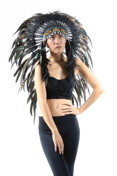 Black Indian headdress replica, chief warbonnet native american inspired, medium length boho headdress Rooster feathers natural black color with dark green shinny highlights Handmade with feathers, suede fabric, beads Hat circumference 59 cm approx, 23,2 inches approx Band: The geometric patterns of the decorative band made with beads on the front of the headdress may have some variations depending on what we have in stock at the time of the production of the headdress.Either way, the final deco Traditional Black Costume Hats And Headpieces For Festivals, Traditional Black Costume Hats For Festivals, Black Bohemian Costume Hats And Headpieces, Bohemian Costume Hats And Headpieces With Feathers For Festivals, Purple Feathers, Black Indians, Indian Headdress, Beaded Hat, Purple Feather