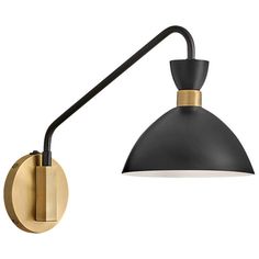 a black and gold wall light with an arm