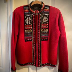 Beautiful Red Wool Icelandic Design Sweater Jacket With More-Finely-Than-Most Detailed Embroidered Front, Collar And Cuffs. Jacket Has A Full Front Zipper And Side Pockets, All Fully Lined. Medium Size - 23" Long, 15" From Armpit. Brand New Condition. Warm And Cozy! Red Fair Isle Pattern Winter Cardigan, Red Fair Isle Cardigan For Winter, Red Fair Isle Winter Cardigan, Red Fair Isle Long Sleeve Outerwear, Casual Red Outerwear With Fair Isle Pattern, Fitted Nordic Style Winter Outerwear, Casual Red Fair Isle Pattern Outerwear, Casual Red Fair Isle Outerwear, Fitted Nordic Outerwear With Fair Isle Pattern