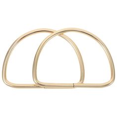 two gold metal rings on a white background