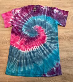 Tie dyed adult Small t-shirt, gender neutral,  100% cotton, Very soft and comfortable. Only the highest quality,  professional dyes used. Washed out with earth-friendly detergent! Will never run or fade! *This is the exact item you will receive! Acid Wash Pre-washed Short Sleeve T-shirt, Hand Dyed Pink Cotton T-shirt, Pre-washed Tie Dye T-shirt For Summer, Relaxed Fit Soft-washed Tie-dye T-shirt, Tie-dye Cotton T-shirt, Unisex Tie Dye Short Sleeve T-shirt, Tie Dye Soft-washed Short Sleeve T-shirt, Cotton Tie-dye Pre-washed T-shirt, Unisex Tie-dye Short Sleeve T-shirt