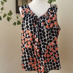 Cute Sleeveless Dotted Blouse. Tie At Neck. Nwot. 100 Poly Pit To Pit 22" Length 26" Polka Dot Sleeveless Tank Top, Summer Sleeveless Polka Dot Blouse, Polka Dot Sleeveless Blouse For Spring, Sleeveless Polka Dot Blouse For Spring, Sleeveless Polka Dot Blouse For Summer, Polka Dot Sleeveless Casual Blouse, Casual Sleeveless Polka Dot Blouse, Sleeveless Top, Womens Tops