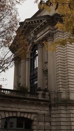 an old building with a clock on the front