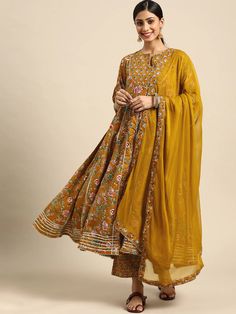 Yellow Cotton Floral Print Angrakha Suit Set with Chiffon Dupatta Yellow Floral Print Kurta, Yellow Bollywood Style Floral Kurta, Festive Designer Floral Print Kurta, Festive Floral Print Sets For Transitional Seasons, Transitional Festive Sets With Floral Print, Transitional Anarkali Kurta With Floral Print, Transitional Floral Print Semi-stitched Salwar Kameez, Floral Print Sets With Traditional Drape For Transitional Season, Semi-stitched Chanderi Palazzo Set With Floral Print