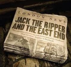 a newspaper laying on top of a stone wall