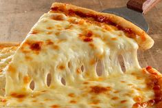 a piece of pizza with cheese on it that says i only eat whole foods so don't you dare to take a slice of my pizza