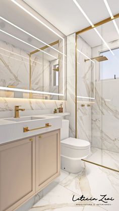 a bathroom with marble and gold accents