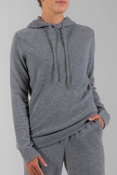 UCXAH00- 100% Recycled Cashmere (60% cashmere | 40% recycled cashmere)- Unisex style can be worn by both men and women - Male model is 6'2" and wearing a size Large - Female model is 5'9" and wearing a size XSmall Casual Cashmere Sweater With Funnel Neck, Winter Cashmere Hoodie Sweater, Long Sleeve Cashmere Sweater With Drawstring Hood, Winter Cashmere Hoodie For Loungewear, Cashmere Sweater With Drawstring Hood, Long Sleeve, Cashmere Long Sleeve Sweater With Drawstring Hood, Long Sleeve Cashmere Hoodie With Drawstring Hood, Casual Cashmere Hoodie For Winter, Cashmere Hoodie With Ribbed Cuffs For Loungewear