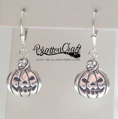 I love the detail on the front and back of these pumpkin earrings! Take a look! There's a Jack O'Lantern on the front and there are vines and a leaf on the back. The pumpkin charms are a TierraCast original design and are made of lead free pewter in the USA. The earrings hang 5/8 inch from the end of the sterling silver jump rings. The leverback is sterling silver with a teardrop accent. These earrings are ready to ship and will arrive in a gift box. Take a look at other BrattonCraft Pumpkin Jew Fun Halloween Earrings, Pumpkin Jewelry, Silver Pumpkins, Williamsburg Va, Earrings Halloween, Pumpkin Earrings, Halloween Earrings, Halloween Jewelry, Cute Pumpkin