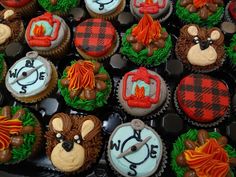 many cupcakes are decorated with different designs