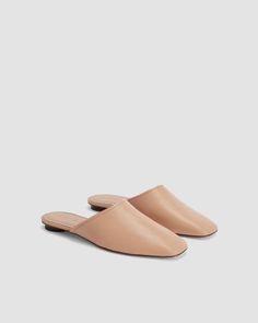 The Day Mule Blush Tan – Everlane Chic Leather Slip-on Mules, Leather Slip-on Mules For Spring, Classic Calf Leather Mules With Square Toe, Leather Mules With Sculpted Heel, Leather Mules With Sculpted Flat Heel, Classic Leather Mules With Sculpted Heel, Chic Leather Slippers With Leather Footbed, Calf Leather Almond Toe Slip-on Mules, Calf Leather Almond Toe Mules