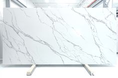 a large white marble slab in a warehouse