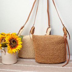 Brown Braided Bags For Beach Season, Natural Braided Rectangular Shoulder Bag, Natural Color Braided Rectangular Shoulder Bag, Trendy Woven Jute Bucket Bag, Trendy Woven Basket Shoulder Bag, Trendy Natural Braided Shoulder Bag, Natural Colored Braided Rectangular Shoulder Bag, Brown Braided Jute Straw Bag, Rectangular Braided Jute Bags