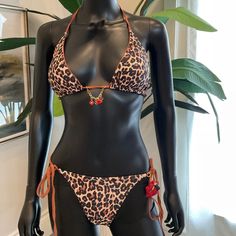 Leopard Print Bikini With Charming Bikini’s Charms! Size Medium Charming Bikini Charms Are The Newest-Hottest Item Out! They Are Removable Charms So You Can Use Them On Other Bikinis. Brand New! Please Ask Questions Before Purchasing No Refunds. Check Out My Other Listings. Brown Beachwear Swimwear For Vacation, Summer Brown Swimwear With Tie-side Bottom, Brown Halter Neck Swimwear, Brown Tie-side Bottom Swimwear For Summer, Beachy Brown Swimwear For Beach Party, Summer Brown Tie-side Swimwear Bottom, Brown Triangle Top Swimwear For Pool, Brown Beachy Swimwear For Beach Season, Brown Triangle Top Swimwear For Beach