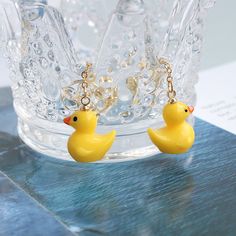 Cute Duck Earrings/Clips PN3166 ●Material: Alloy ●Size:4.2*1.3cm ●About Shipping: We attach great importance to the orders of each customer and parcel delivery. 1.Processing time: 2-3 business days. 2.Shipping time: 10-15 business days to US, please allow 3-4 weeks shipping to other country.(Shipping times can be affected by variable customs clearance times or public holidays.) Summer Dangle Clip-on Earrings As A Gift, Summer Gift Dangle Clip-on Earrings, Summer Clip-on Drop Earrings As Gift, Yellow Novelty Earrings With Ear Wire, Novelty Yellow Earrings With Ear Wire, Summer Gift Drop Clip-on Earrings, Cute Clip-on Earrings As A Gift, Novelty Gold Earrings, Yellow Metal Hoop Earrings As Gift