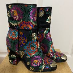 Flowered Steven Madden Boots No Tags But Never Worn Boots Fall Floral Print Boots With Round Toe, Winter Floral Print Boots, Multicolor Round Toe Heeled Boots For Party, Multicolor Heeled Boots With Round Toe For Winter, Multicolor Round Toe Heeled Boots For Winter, Multicolor Floral Print Boots With Round Toe, Spring Multicolor Heeled Boots With Round Toe, Red Booties For Spring, Chic Multicolor Boots For Fall