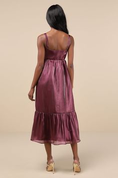 The first step towards being the best-dressed guest is making sure you arrive in the Lulus Extravagant Initiative Shiny Plum Organza Bow Midi Dress! Shiny, organza-like fabric shapes this insanely darling dress with slender adjustable straps that support a sleeveless bodice with a sweetheart neckline and a dramatic, oversized bow at the front. The babydoll-inspired silhouette features a high waist and an A-line skirt that falls to a tiered midi hem. Hidden side zipper/clasp. Fit: This garment fi Sheer Organza Midi Dress For Cocktail, Sheer Organza Midi Cocktail Dress, Sheer Organza Cocktail Evening Dress, Sheer Organza Evening Dress For Cocktails, Sheer Organza Cocktail Dress, Sheer Organza Fitted Dresses, Sheer Organza Midi Dress For Wedding, Sheer Organza Dress With Fitted Bodice, Fitted Organza Midi Dress For Wedding Guest