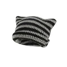 a black and white knitted hat on a white background