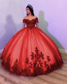 Step into your dream Quinceanera with the Fiora Ball Gown. This exquisite gown features a classic ball gown silhouette, beautifully crafted from layers of luxurious tulle fabric that add volume and movement to your every step. It is available in vibrant colors like royal blue, red, pink, purple, and green. The lace-up back ensures a perfect fit, accentuating your figure while adding a touch of classic charm. The intricate applique details and delicate beading sparkle with every turn, making you Off The Shoulder Quinceanera Dress, Dream Quinceanera, Gown Silhouette, Dress Ball Gown, White Homecoming Dresses, Exquisite Gowns, Blue Homecoming Dresses, Gown Style, Quinceanera Dress