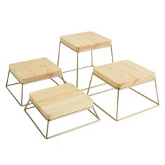 three wooden tables sitting on top of each other with metal frame bases and wood tops