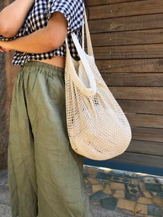 'Handmade Beach Bag' This is a handmade all purpose bag made of extremely strong repurposed cotton and can hold ANYTHING and EVERYTHING Use it for grocery shopping, as a weekender/market bag, or to take your belongings to the beach 🌊 🥥 🌴 ☀️ This is a handmade item. Each make has its own character and may differ slightly from what is captured.  We source organically and ethically grown fabrics around India and work with local tailors and designers. By purchasing this, you are helping small communities in India grow both economically and artistically. Sac Week End, Beach Bum, Market Bag, Beach Bag, Piece Of Clothing, Summer Beach, Bag Making, Eco Friendly, Purses And Bags