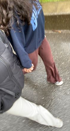 two people with their feet on the ground