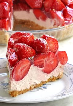 a slice of cheesecake with strawberries on top