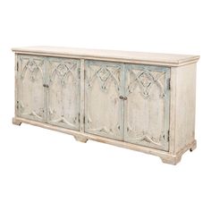 A Rustic French Gothic cabinet. This cabinet has four doors featuring a gothic arch design. A beautiful statement piece, perfect to use as a cabinet or sideboard.   This piece is crafted in pine and features an antique whitewashed blue finish.   Dimensions: 78" W x 20" D x 34" H Gothic Cabinet, French Gothic, Gothic Arch, Display Bookcase, Modern Gothic, Buffets And Sideboards, Kitchen Refresh, Antique Sideboard, White Sideboard