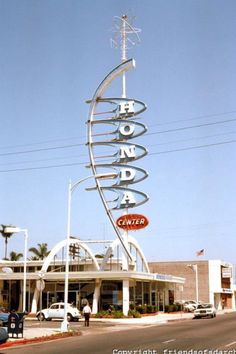 a large sign on the side of a building that says hotel canada in front of it