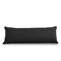 a black pillow on a white background with no one in the room to see it