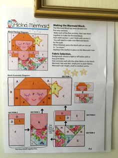 the instructions for making an origami mermaid doll are displayed on a bulletin board