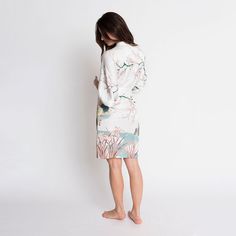 This beautiful, mid-weight short floral kimono robe is easy to clean and easy to wear. Find your favorite color and order one online today from KIM+ONO! Spring Long Sleeve Sleepwear With Tie Waist, Long Sleeve Tie Waist Sleepwear For Spring, Spring Daywear Robe With Tie Waist, Tie Waist Kimono For Loungewear, Daywear Long Sleeve Kimono With Tie Waist, Feminine Long Sleeve Kimono For Loungewear, Spring Daywear Wrap Robe, White Tie Waist Long Sleeve Robe, Daywear Wrap Kimono With Tie Waist