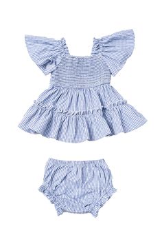 Our Baby Indie Dress Set in Blue Gingham is perfect for your little fashionista! Made with a soft cotton blend fabric, this dress features a playful blue and white gingham print. The square neckline, ruffle detailing, and flutter sleeves add a touch of whimsy. With a comfortable pull-over style and stretchy smocked bodice, your baby will be able to move freely and comfortably. Available in sizes 0-3 months, 3-6 months, 6-9 months, + 9-12 months! baby romper, summer style, gingham romper, baby Blue Cotton Dress With Ruffle Sleeves, Summer Dress With Smocked Bodice For Playdate, Fitted Gingham Plaid Dress With Ruffles, Cute Gingham Square Neck Dress, Spring Blue Plaid Cotton Dress, Gingham Tiered Ruffle Dress, Gingham Tiered Dress With Ruffles, Gingham Dress With Ruffle Hem And Square Neck, Fitted Blue Plaid Dress For Spring