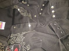 "This black button up has pearl snaps and beautiful embroidery and is in excellent condition. Made in Denver, Colorado. Size 16 1/2\" X 36\"" Traditional Black Tops With Buttons, Cowboy Dress, Mens Dress Shirts, Black Cowboy, Cycling Cap, Tacoma Wa, Poker Cards, Mens Dress, Denver Colorado