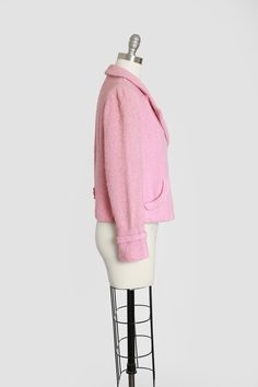 "Vintage 1950s pink wool coat Button down front + front pockets Fully lined in pink crepe Cropped swing fit Great vintage condition Measurements: Fits like a M L Bust: 20\" Waist: 21\" Total Length: 22\" Sleeves: 23\" Shoulders: 16\" Label: Elizabethian exclusive fishuans of Elizabeth +All Measurements are taking while garment is lying flat + instagram@ Cali_vintage_usa" Pink Blazer With Lapel Collar And Buttons, Pink Wool Blazer For Work, Pink Blazer With Buttons For Winter, Pink Blazer With Lapel Collar For Winter, Fitted Pink Pea Coat For Work, Pink Wool Blazer For Workwear, Classic Pink Winter Blazer, Pink Wool Blazer For Winter, Winter Pink Wool Blazer