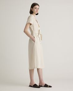 This midi linen dress should be in every wardrobe. Made from 100% organic linen and designed to be versatile, with elegant buttons down the front, and two pockets at the waist, and adjustable removable belt for the perfect fit.  | Quince | Women's Short Sleeve Dress in Sand, Size Medium, Linen Belted Linen Dress For Daywear, Chic Belted Linen Dress For Work, Elegant Belted Linen Dress For Work, Spring Workwear Linen Dress With Buttons, Elegant Beige Linen Workwear Dress, Chic Beige Linen Workwear Dress, Chic Beige Linen Work Dress, Belted Midi Linen Dress For Work, Chic Linen Belted Midi Dress