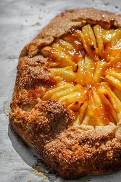 an apple pie is sitting on the table