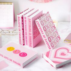 pink and white stationery with cute embellishments on the front, back and sides