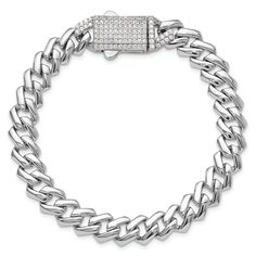 Rhodium over sterling silver Monaco link chain bracelet with cubic zirconia stones and polished finish. Measures approximately 7 1/2"L x 5/16"W. Completes with box catch clasp. Classic Chain Bracelet With Cubic Zirconia, Elegant Silver Cuban Link Diamond Bracelet, Silver Cuban Link Bracelet With Cubic Zirconia, Silver Elegant Cuban Link Bracelet With Cubic Zirconia, White Gold Cubic Zirconia Chain Link Bracelet, White Gold Cubic Zirconia Link Chain Bracelet, Silver Cuban Link Tennis Bracelet For Formal Occasions, Silver Cubic Zirconia Chain Tennis Bracelet, Sterling Silver Tennis Bracelet With Diamond Accents