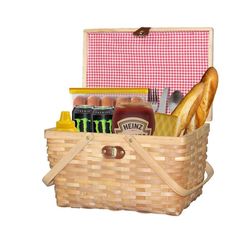 a picnic basket filled with bread and condiments