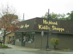 the front of a children's store on a rainy day