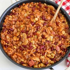 a skillet filled with beans and meat