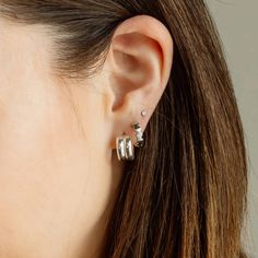 These ethically-made silver huggie hoop earrings are more than just a fashion statement; they're also a statement of quality, ensuring trendy modernity and high-impact minimalism wherever the day takes you! Details: Size: 13mm x 7mm Post Material: stainless steel, nickel free Hoop Material: stainless steel with sterling silver plating Your purchase promotes living wage jobs, innovation, and entrepreneurship. All profit from the sale of these earrings is donated to stop human trafficking. Modern Metal Huggie Earrings For Everyday, Trendy Small Hoop Sterling Silver Huggie Earrings, Trendy Small Hoop Huggie Earrings In Sterling Silver, Trendy Sterling Silver Huggie Earrings For Everyday Wear, Trendy Sterling Silver Small Hoop Huggie Earrings, Trendy Everyday Huggie Earrings With Ear Wire, Trendy Everyday Sterling Silver Huggie Earrings, Trendy Everyday Huggie Earrings, Classic Silver Wrap Earrings For Everyday