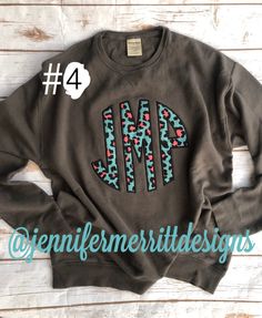 Comfort Color monogram sweatshirt comes with a large chest leopard fabric appliqué that is perfect to wear on cool fall days or brighten up your winter wardrobe! Comfort Colors sweatshirts are out of stock. Comfort Wash brand is a great alternative. Light weight and oversized. Choose CW Railroad Gray or Comfort Wash Gray. 🐆 Leopard fabric shown is out of stock. You will get option #2 #3, #4, #5 or #6. If you don't specify in the notes at checkout then I will pick. Sweatshirt show is pepper with Casual Monogram Print Sweater For Fall, Casual Monogram Print Sweatshirt For Winter, Black Monogram Print Tops For Fall, Fall Monogram Print Long Sleeve Sweater, Casual Long Sleeve Monogram Sweatshirt, Casual Long Sleeve Sweatshirt With Monogram Print, Casual Fall Tops With Letter Patch, Cotton Monogram Print Top For Fall, Fall Letter Patch Crew Neck Sweatshirt