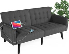 a couch with an electronic device hooked up to it