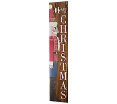 a wooden sign that says merry christmas with a santa clause on the front and bottom