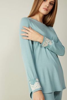 Long sleeve modal crewneck top with large cuffs embellished with two-tone lace trim and contrasting colored piping. Pretty Flower, Pretty Flowers, Piping, Lace Trim, Two Tone, High Neck Dress, Long Sleeve Blouse, Womens Tops, Trim